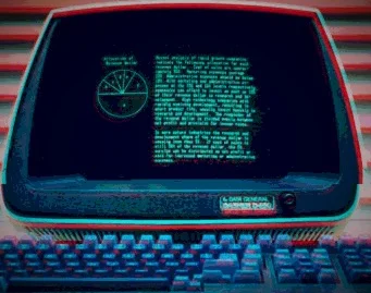 Retro dator med grön text på skärmen